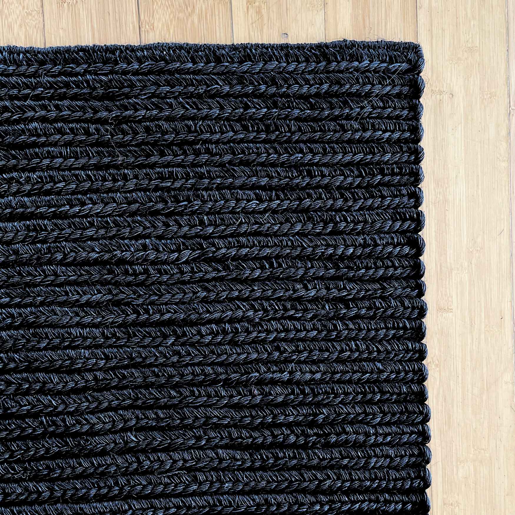 handmade black indoor doormat