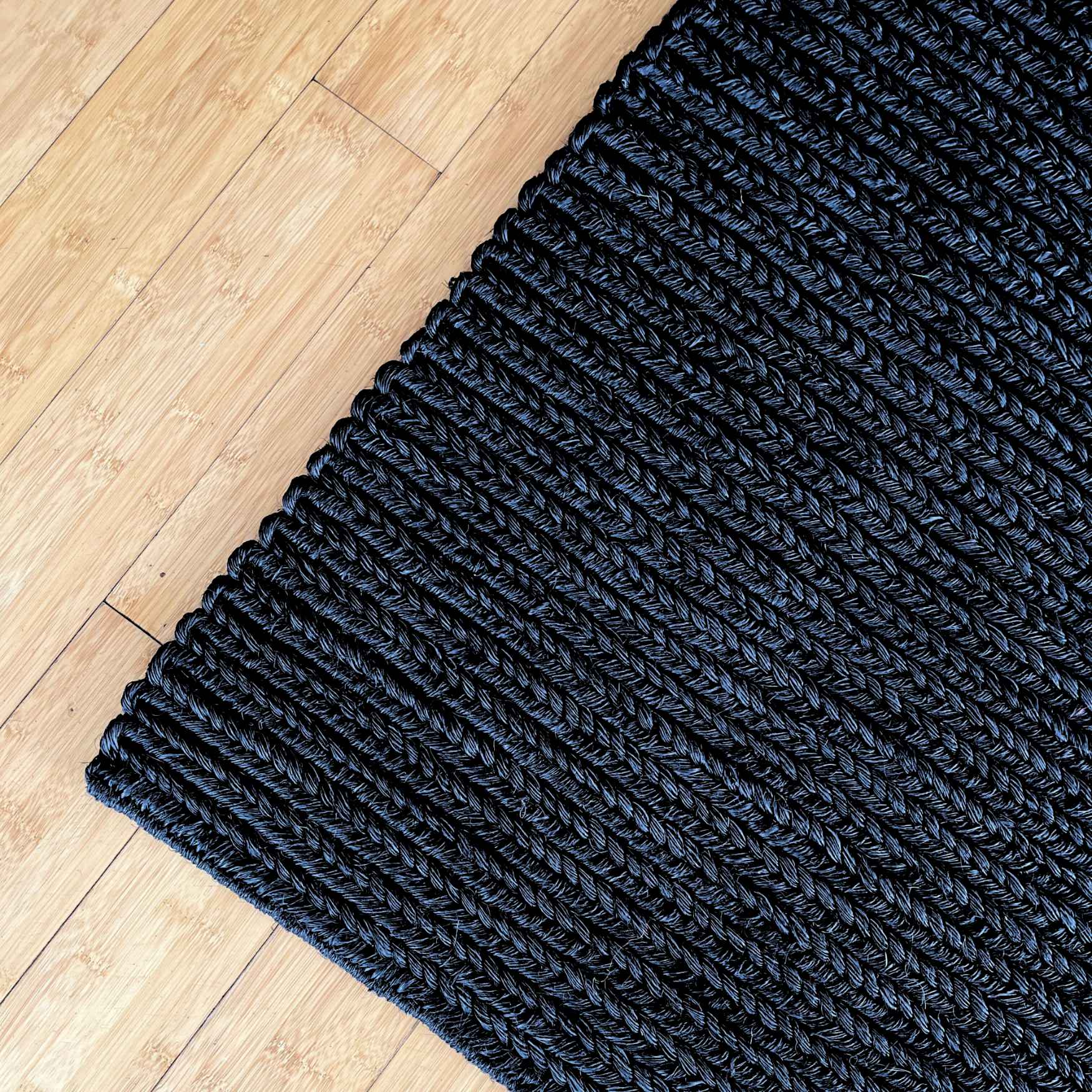 handbraided black rug